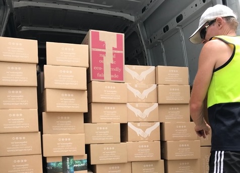 a van is loaded with Go for Zero boxes